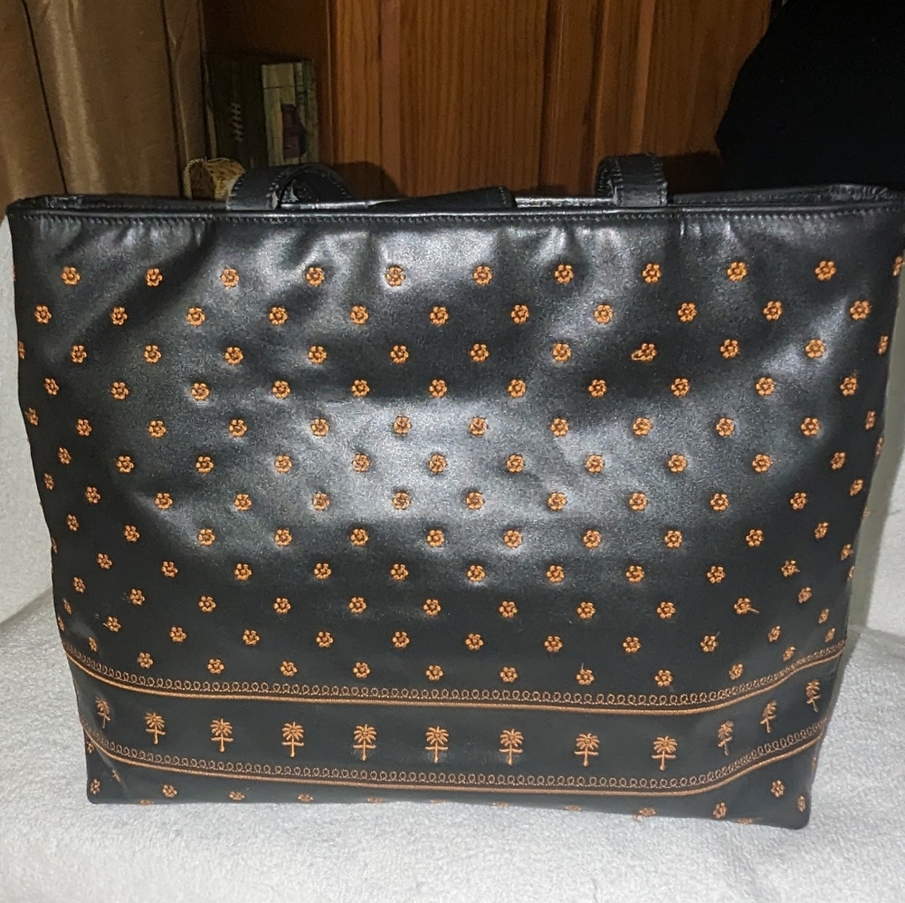 Adrienne Vittadini black embroidered leather satchel bag.